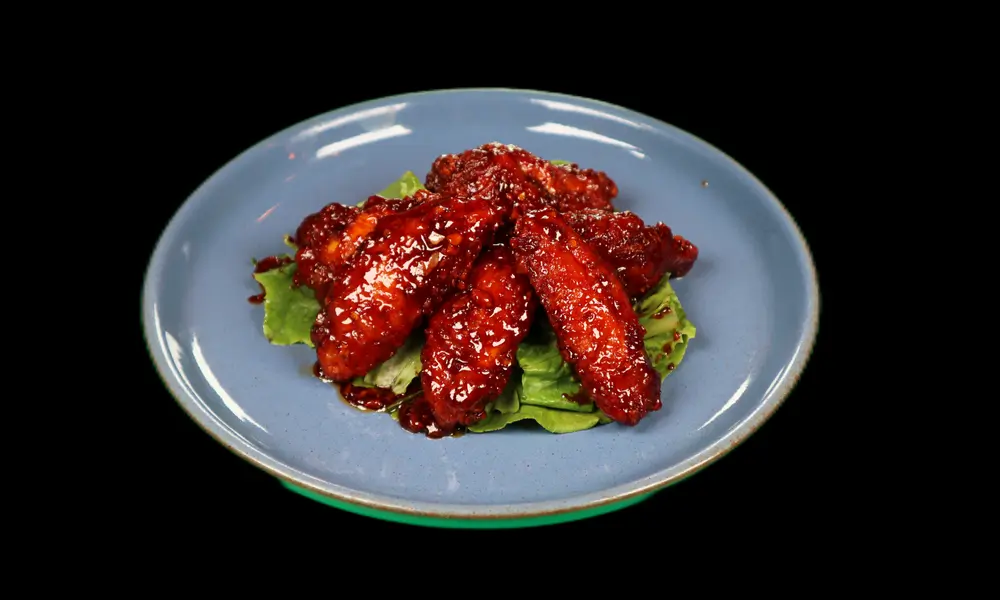 Garlic honey chicken wings, appealing color at Hibachi Lee, a Asian Fusion restaurant in Brooklyn