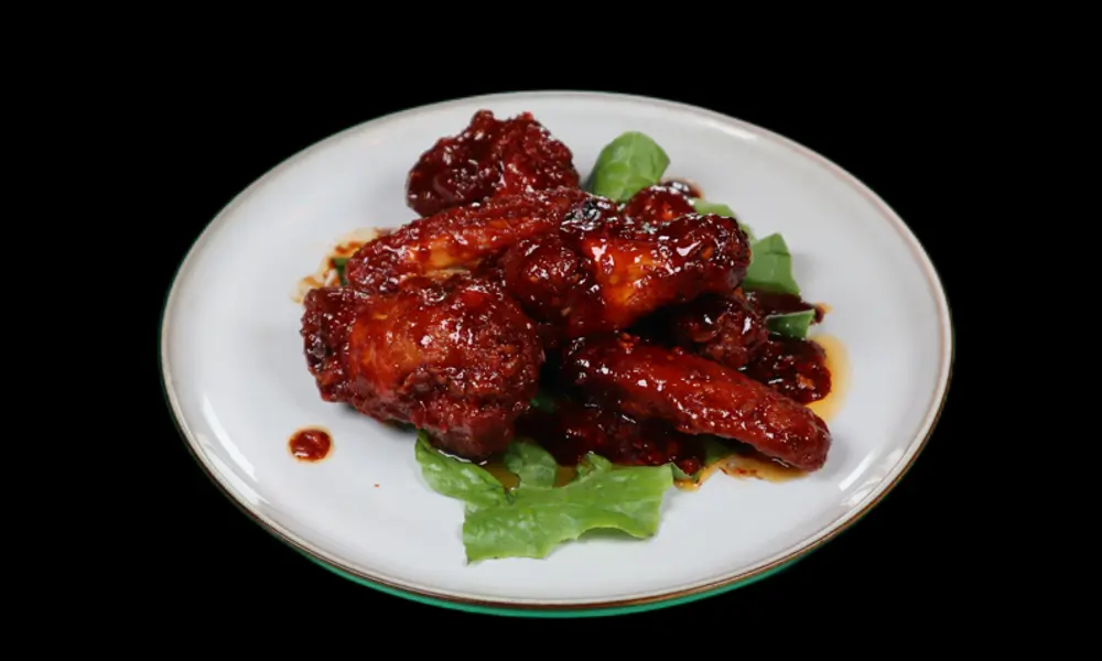Hibachi-Lee-Asian-Fusion-restaurant-Spicy-Garlic-Wing-Brooklyn spicy garlic chicken wings, bright color, spicy aroma at Hibachi Lee, a Asian Fusion restaurant in Brooklyn